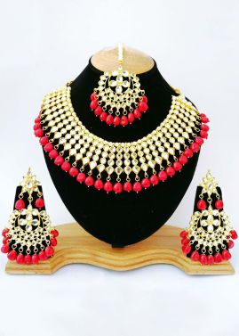 Pearl Red Stone Studded Kundan Necklace Set