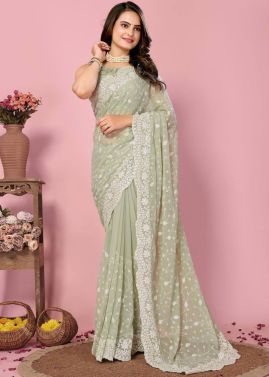 Green Sequins Embroidered Saree In Georgette