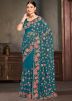 Blue Embroidered Saree In Net
